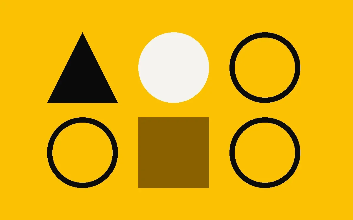 Brand guidelines pages on a desk