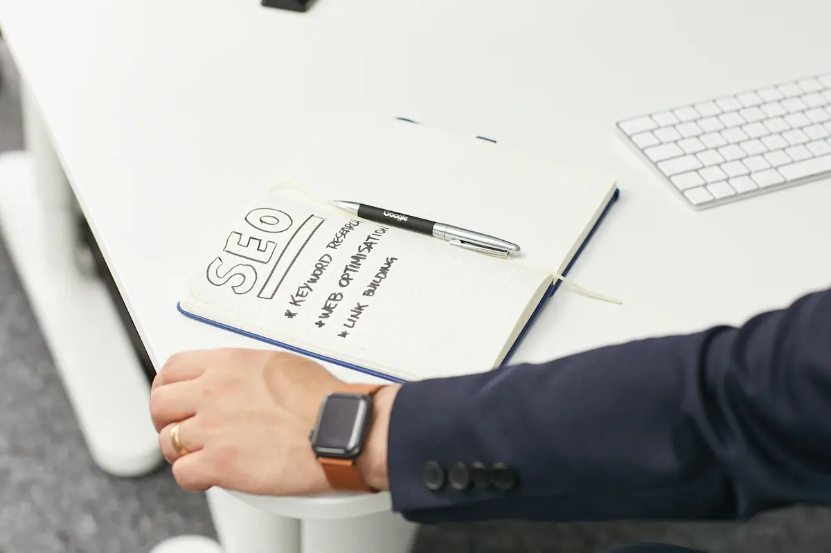 How long does SEO take: notebook listing keyword research, web optimisation and link building